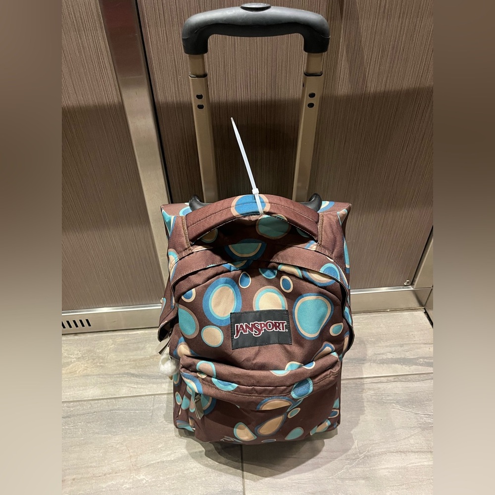 Jansport Brown Polka Dot  carry on